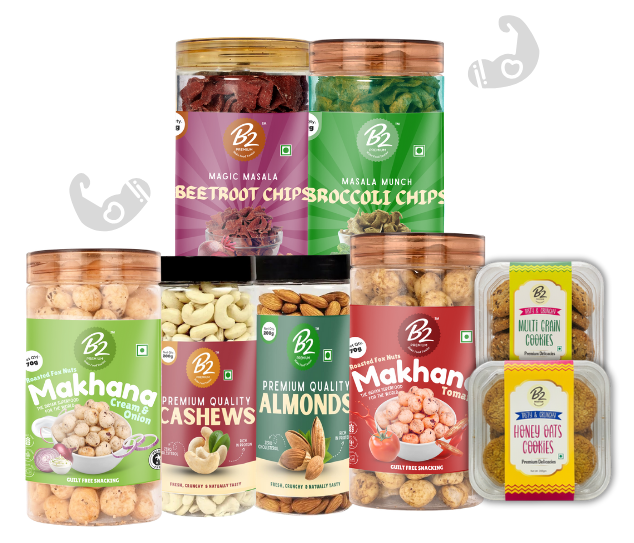 B2 Premium Healthy Snacks Collection – Chips, Makhana, Dry Fruits & Cookies B2 Premium healthy snacks assortment including beetroot chips, broccoli chips, makhana, cashews, almonds, multigrain cookies, and honey oats cookies in jars and packs.